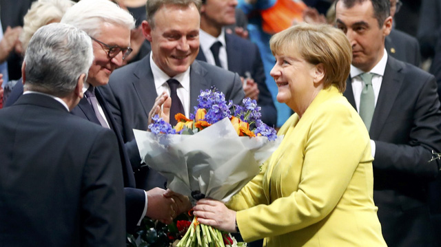 Thủ tướng Merkel chúc mừng ông Steinmeier đắc cử (Ảnh: Reuters)