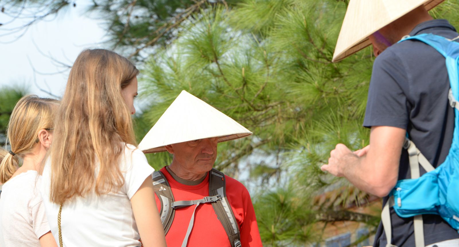All of the tourists coming to Hue want to wear the “non bai tho” (conical hat with poem shrouded in its leaves) of Hue