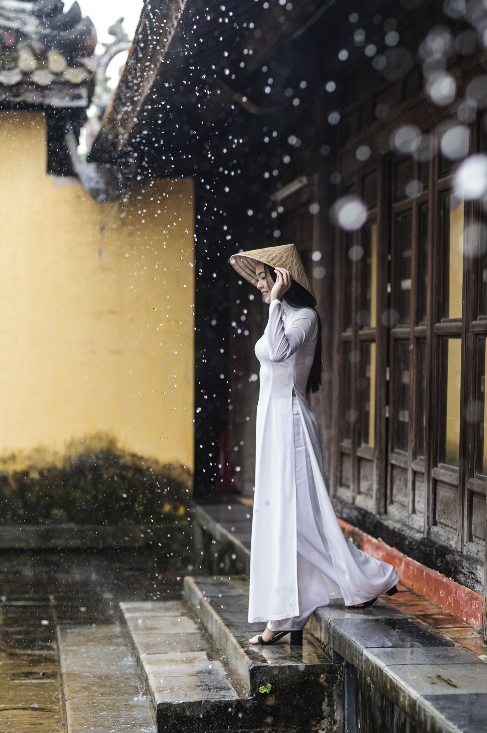 Gentle ao dai in Hue rain