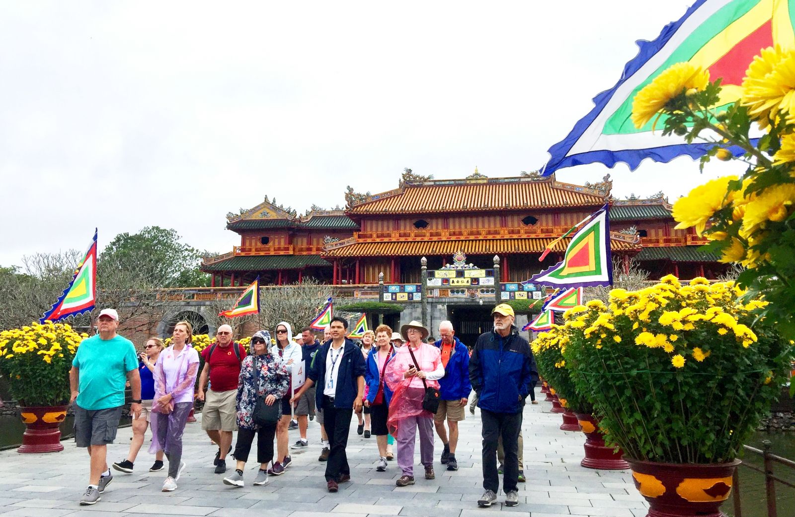 Tourists coming to Thai Hoa palace in a winter day to enjoy the 