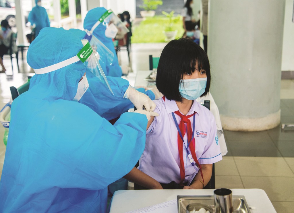 Wearing school uniforms to get vaccinated