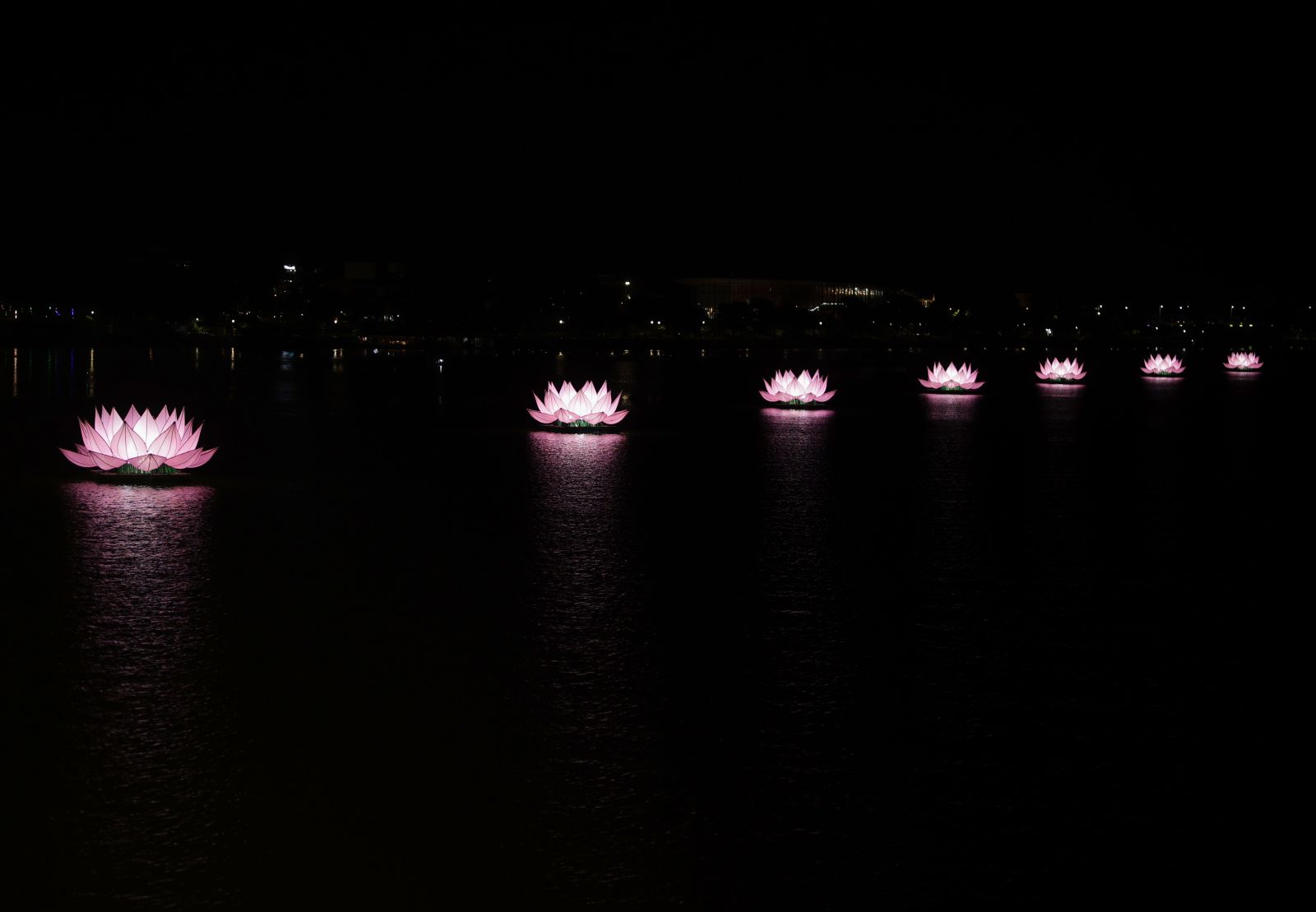 The 7 lotus flowers are lit on the Perfume River