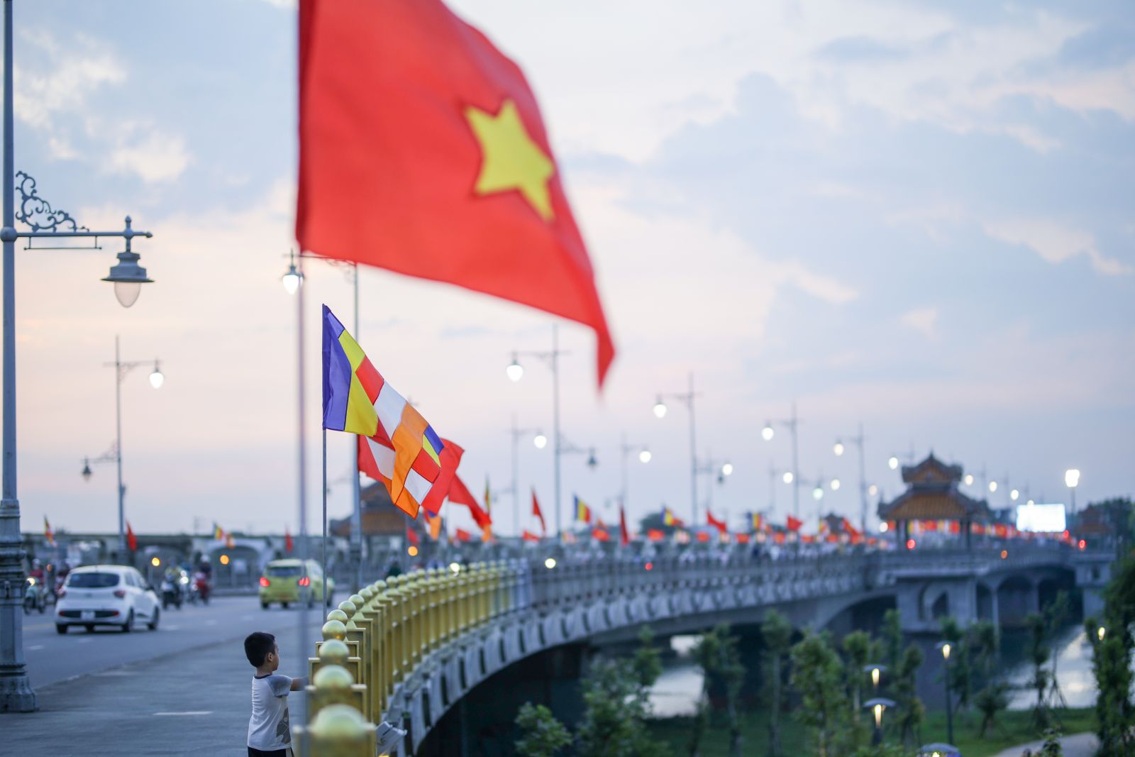 Colorful flags at Da Vien Bridge