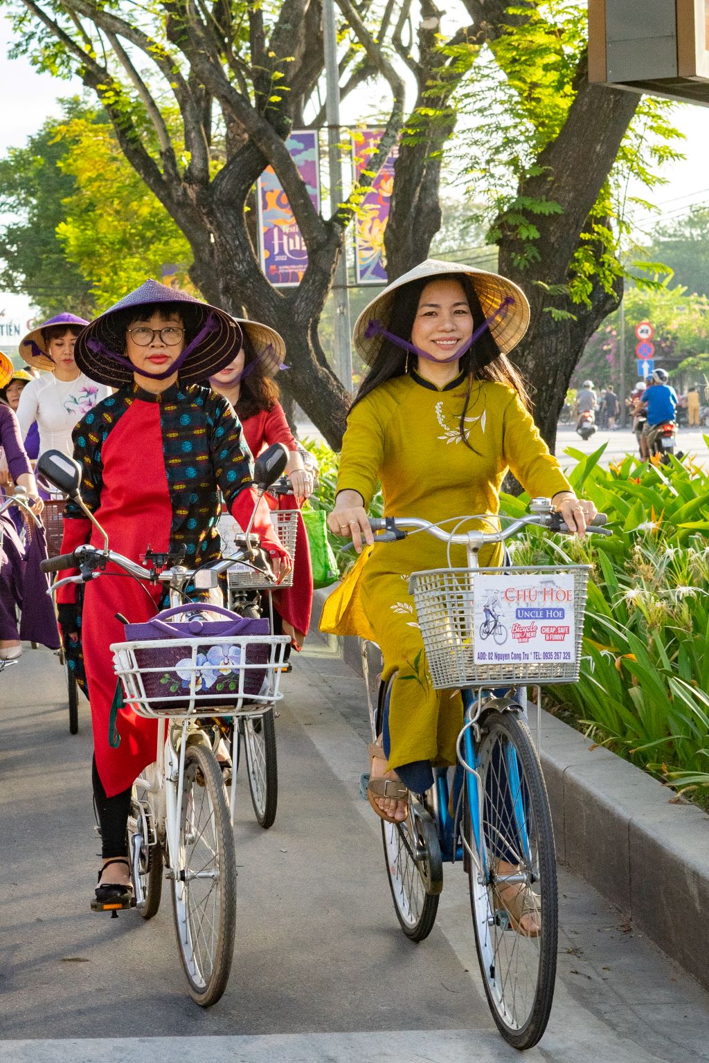 The smiles of the Hue women in ao dai