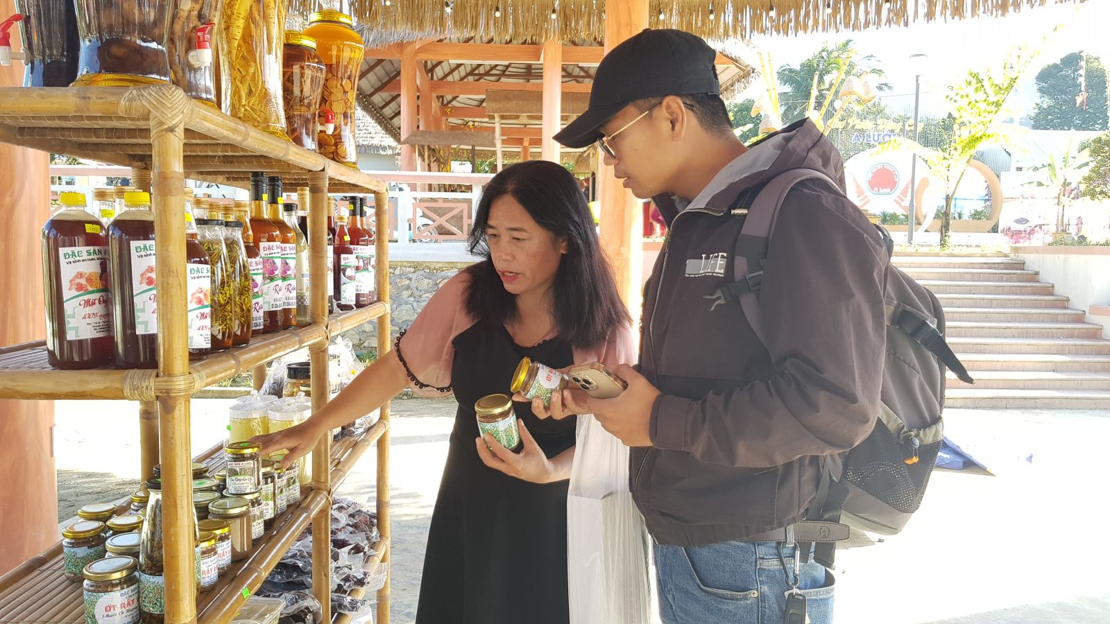 Buying A Luoi specialty salt at A Luoi market stall