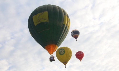 Hot air balloons flying in the sky of Ancient Capital