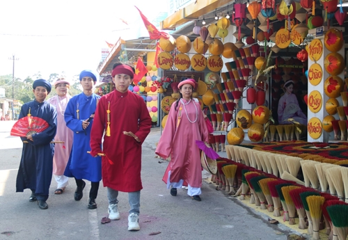 Colorful antique clothing on Tet holiday in Thuy Xuan incense village